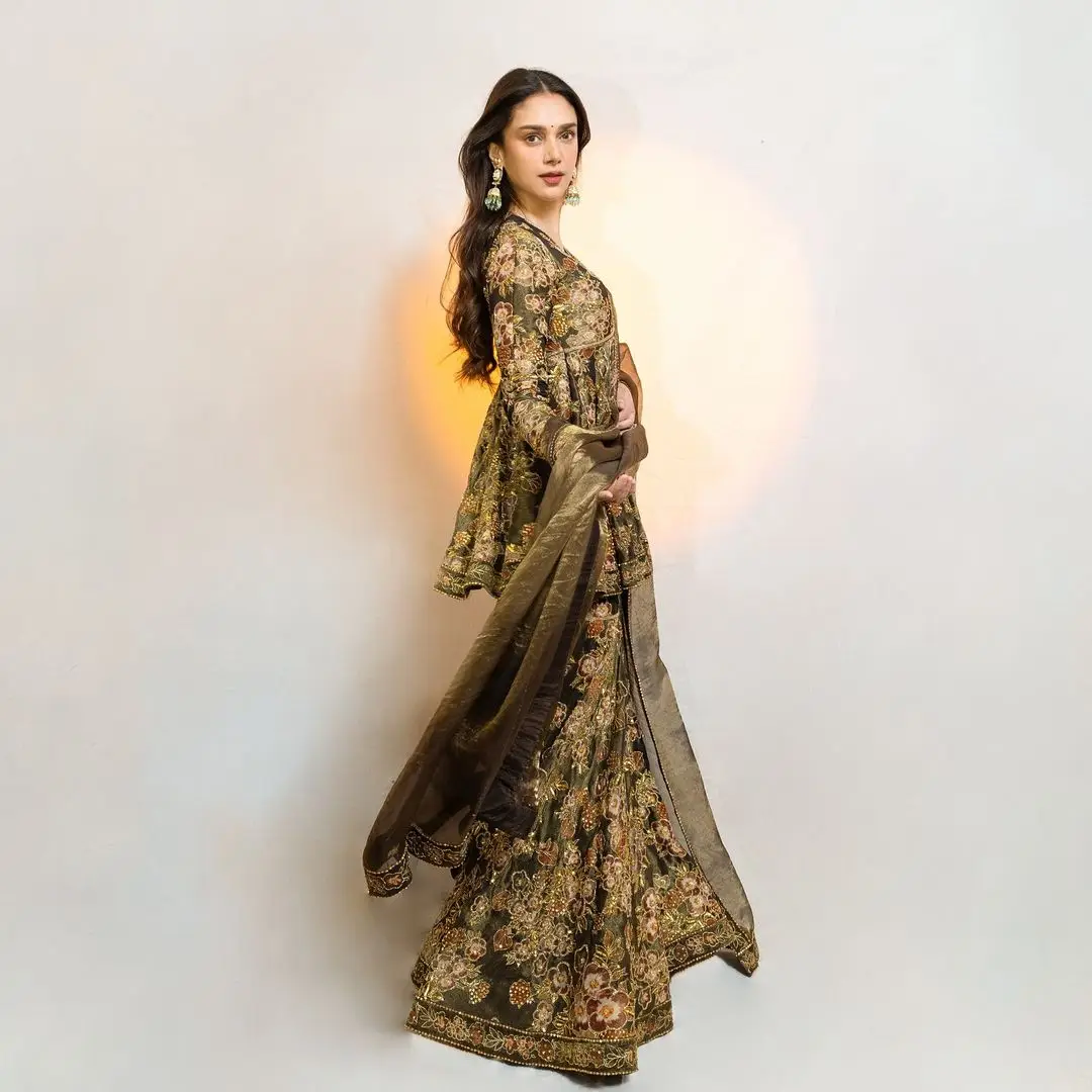 Hindi Actress Aditi Rao Hydari Stills In Green Designer Gown